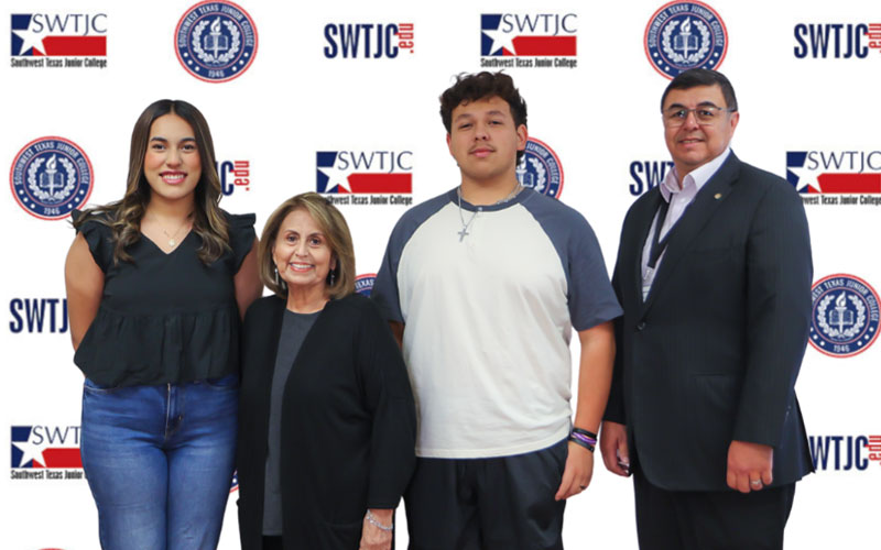 Emily Castillo and Gilbert Garza pose alongside Mrs. Eunice Sosa and SWTJC President Hector Gonzales.